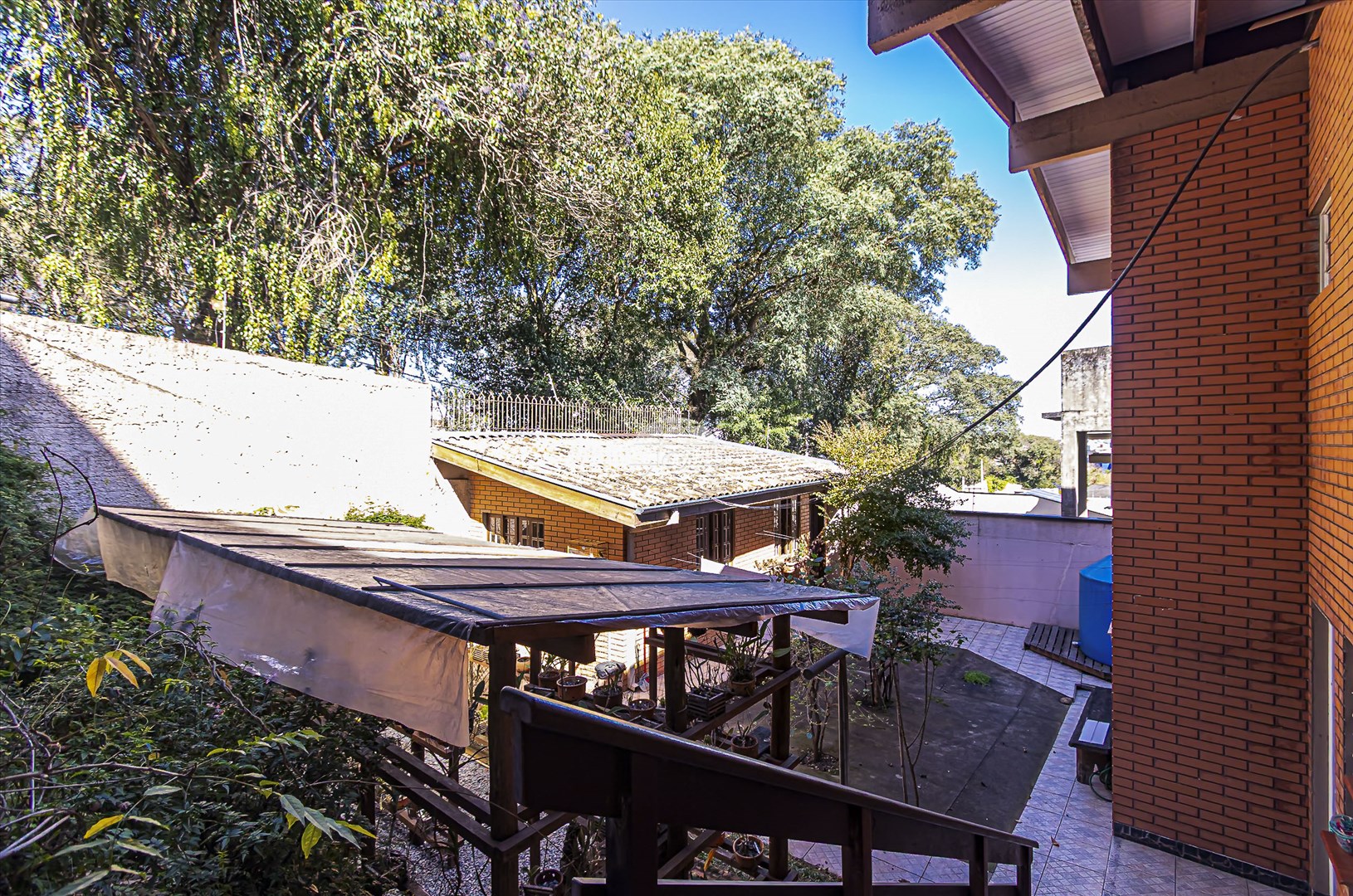 Casa à venda em Jardim Botânico, Curitiba — Imobiliária Cilar